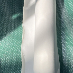 Funda de tela multiel&aacute;stica blanca importada.